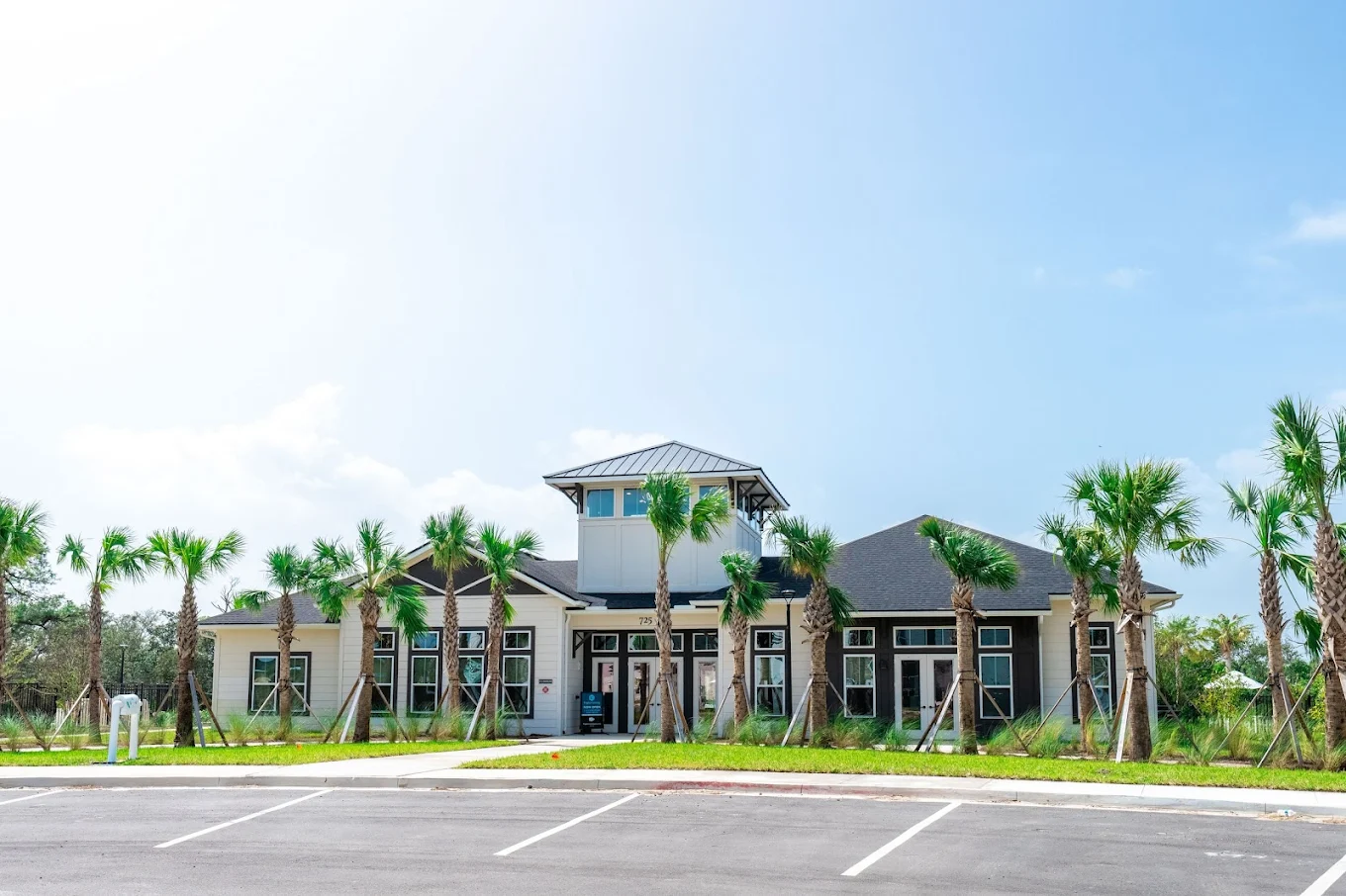 Flagler Crossing building exterior during siding installation