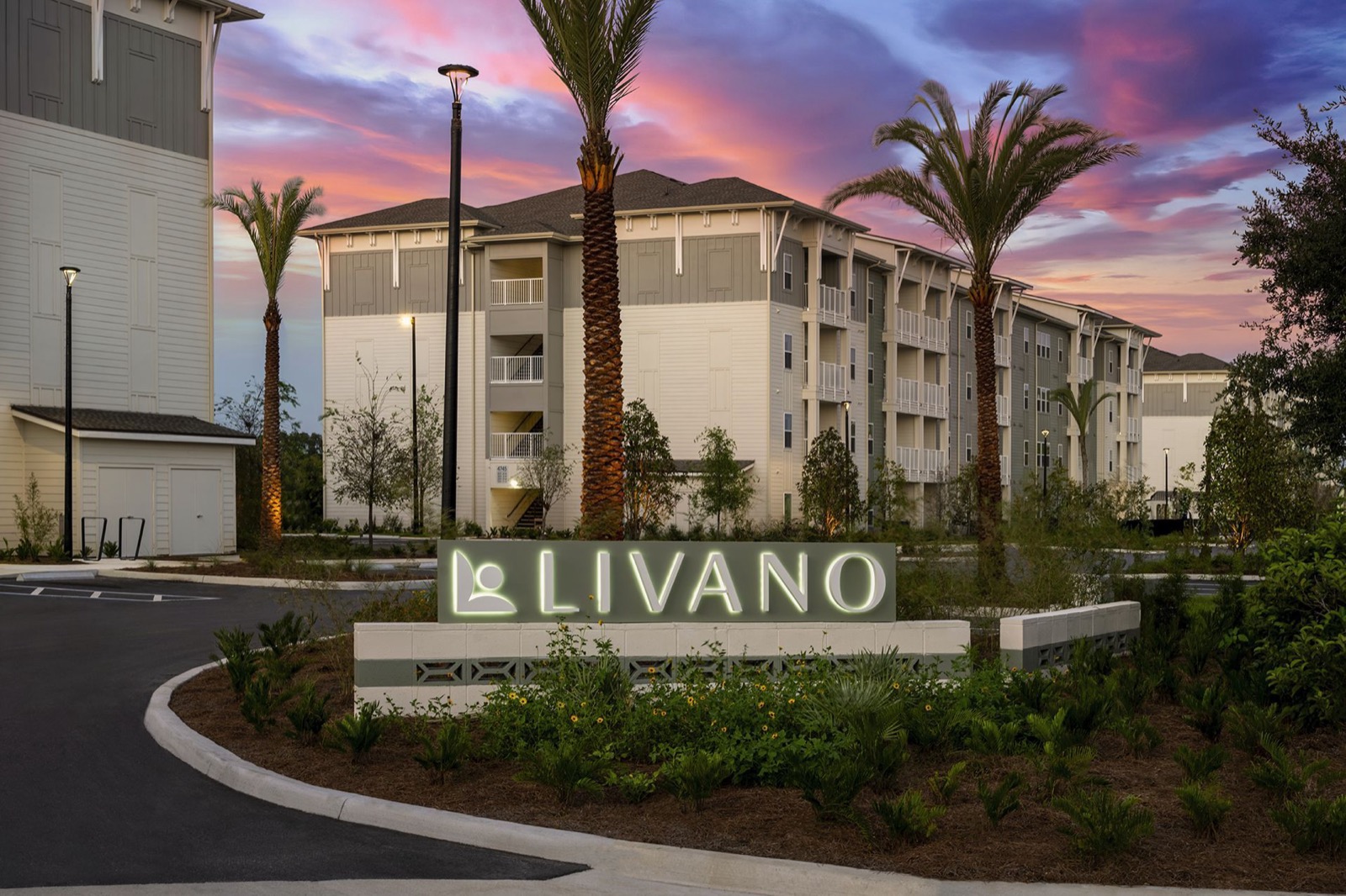 Livano Wildwood entrance and building elevations at dusk