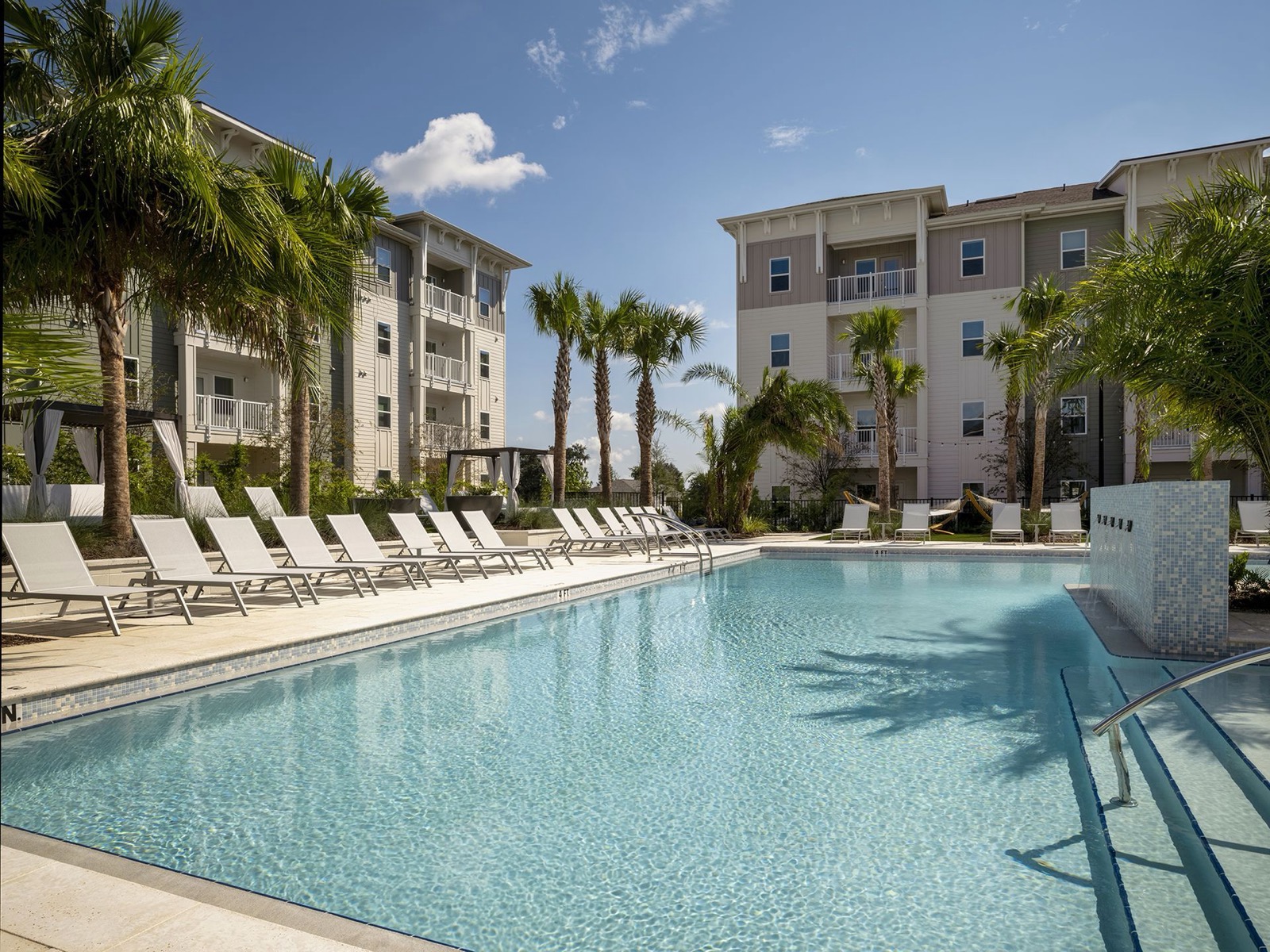 Livano Wildwood buildings around the pool courtyard
