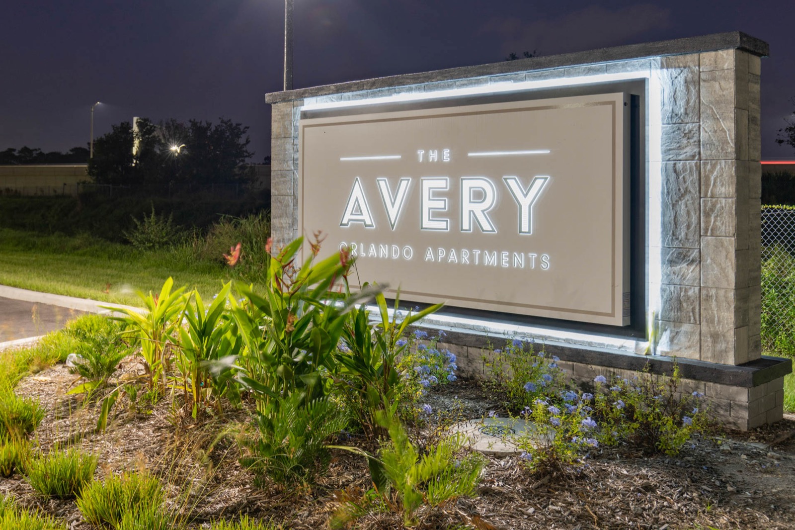 The Avery entrance monument sign at night