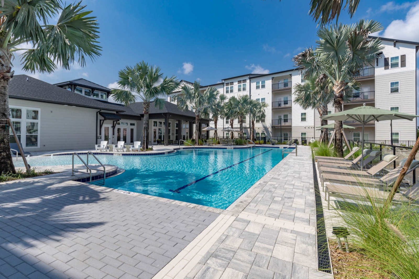 Clubhouse and building elevations beside the pool at The Avery